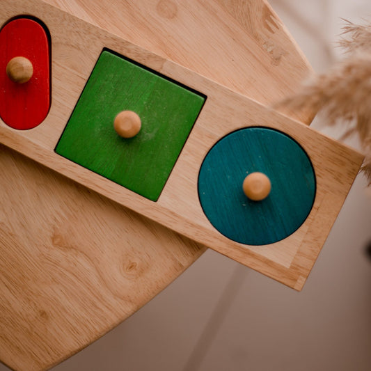 QToys Giant Shape Knobbed Puzzle - Wooden Montessori toy, on a table. 